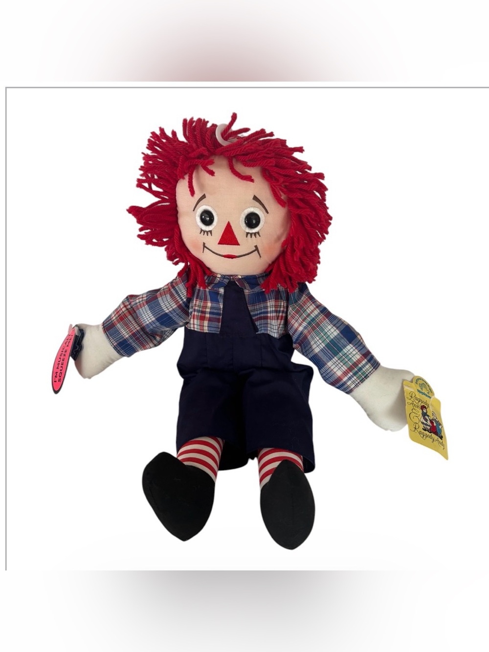 vintage 17-inch Raggedy Andy collector doll was produced by Applause Inc.